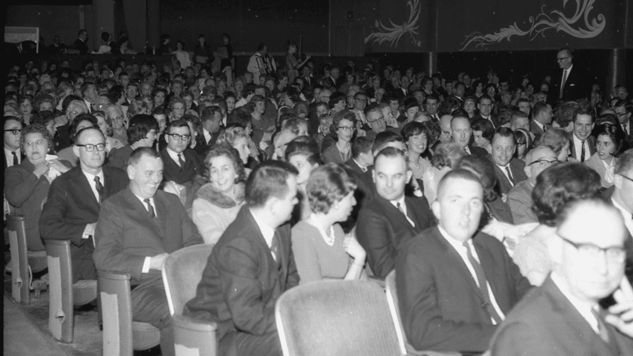 Crowd of people waiting for show to start at Riverview Theater